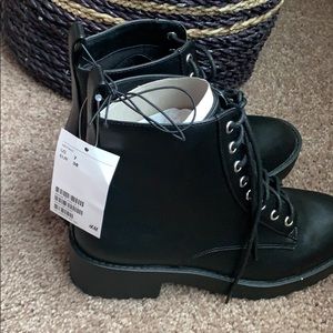 Brand new size 7 black combat boots.